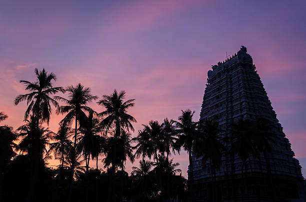 Hindu temple tower at sunset.