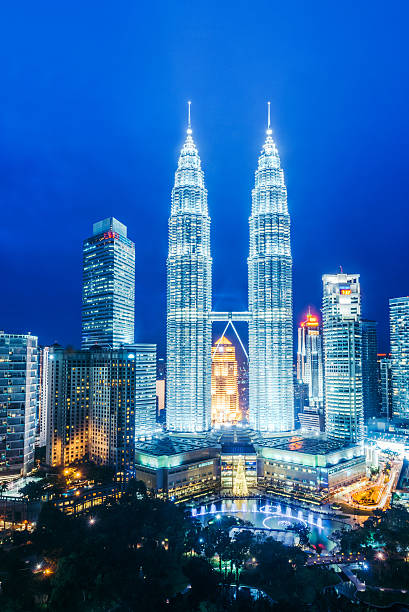 A cityscape with Petronas towers of the downtown area of Kuala Lumpur, capital city of Malaysia