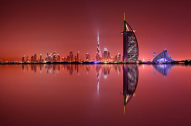 Dubai skyline reflection at amazing night, Dubai, United Arab Emirates