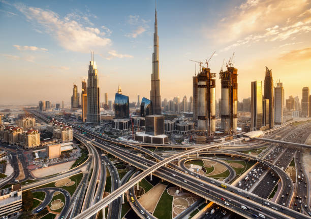 Spectacular skyline of Dubai, UAE.  Futuristic modern architecture of a big city at sunset. Aerial view.
